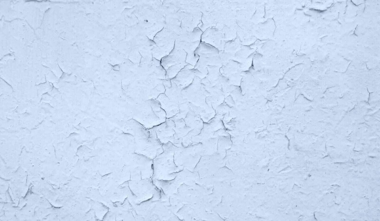 Bubbling, peeling paint on a wall — an early sign of hidden water damage